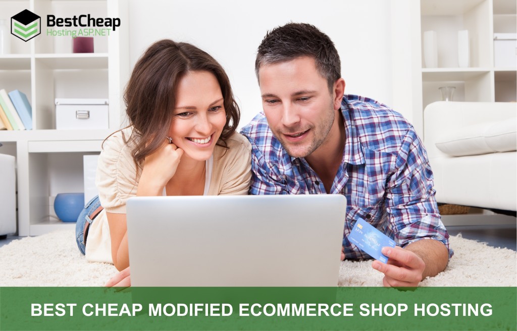 Couple Shopping Online Using Laptop And Credit Card